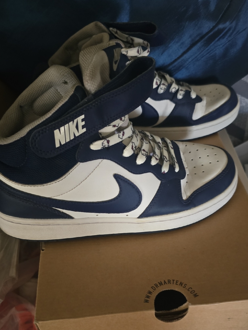 Nike Women’s Mid-Top Sneakers in White and Navy